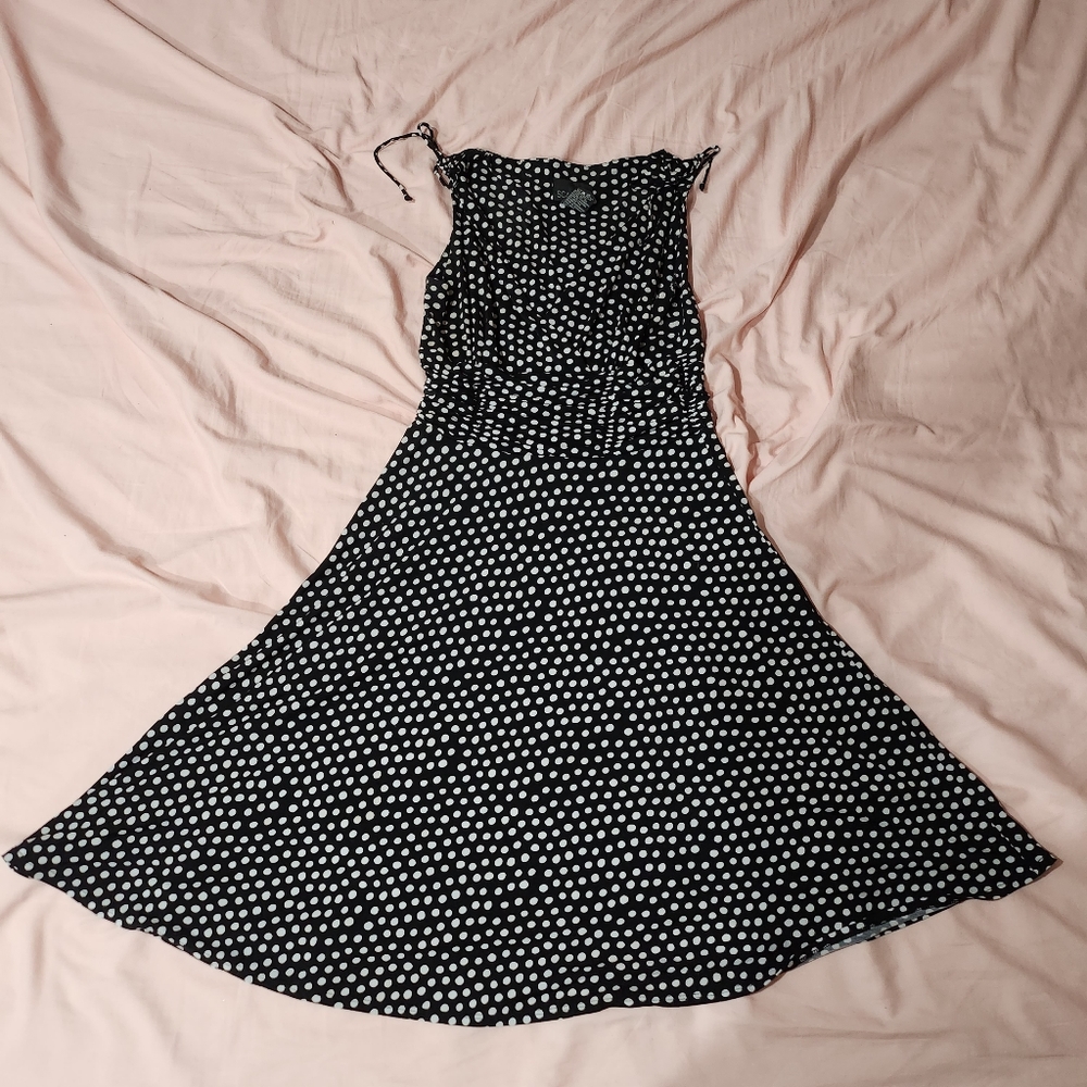 Black v-neck dress with white polka-dots